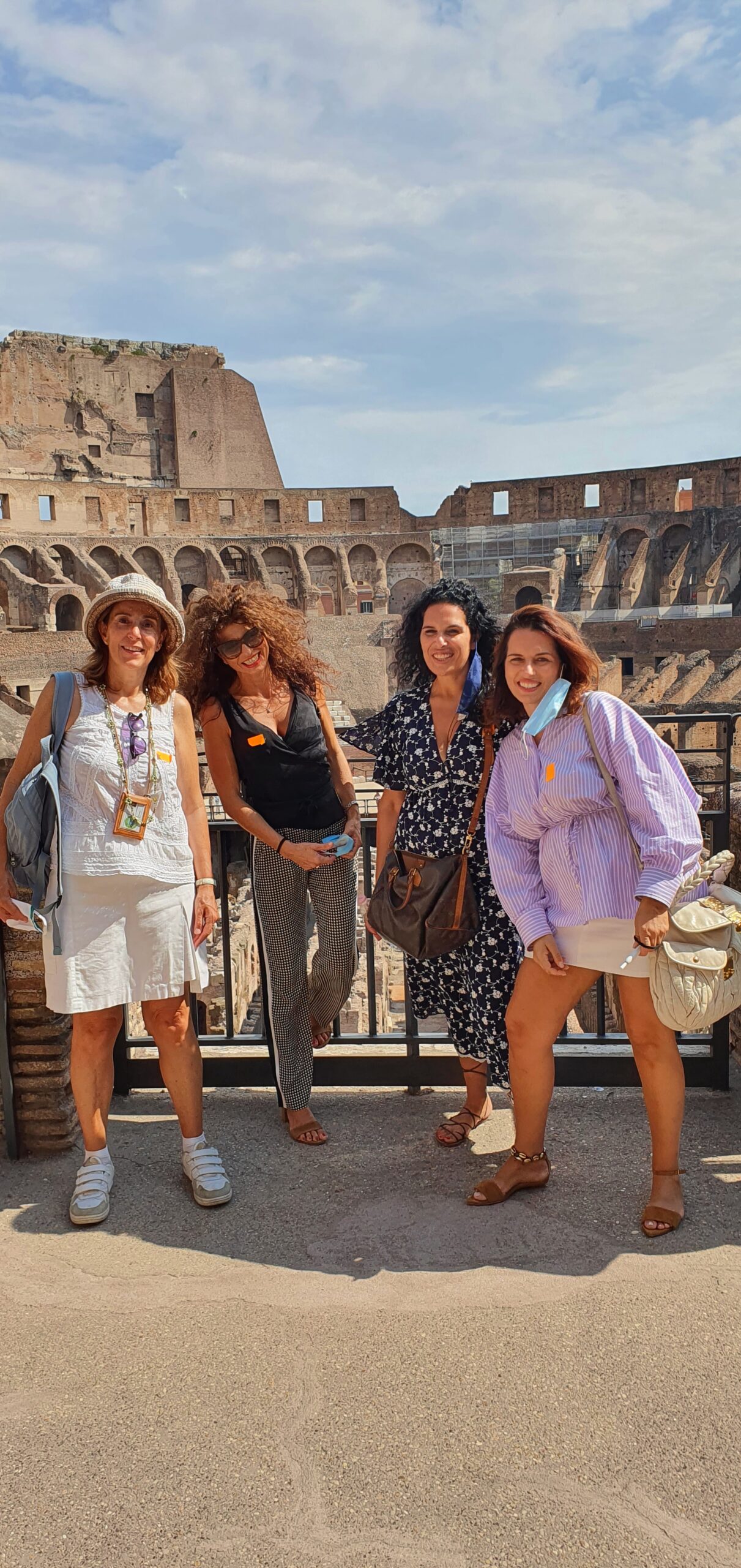 Colosseum and three ladies from Puglia 