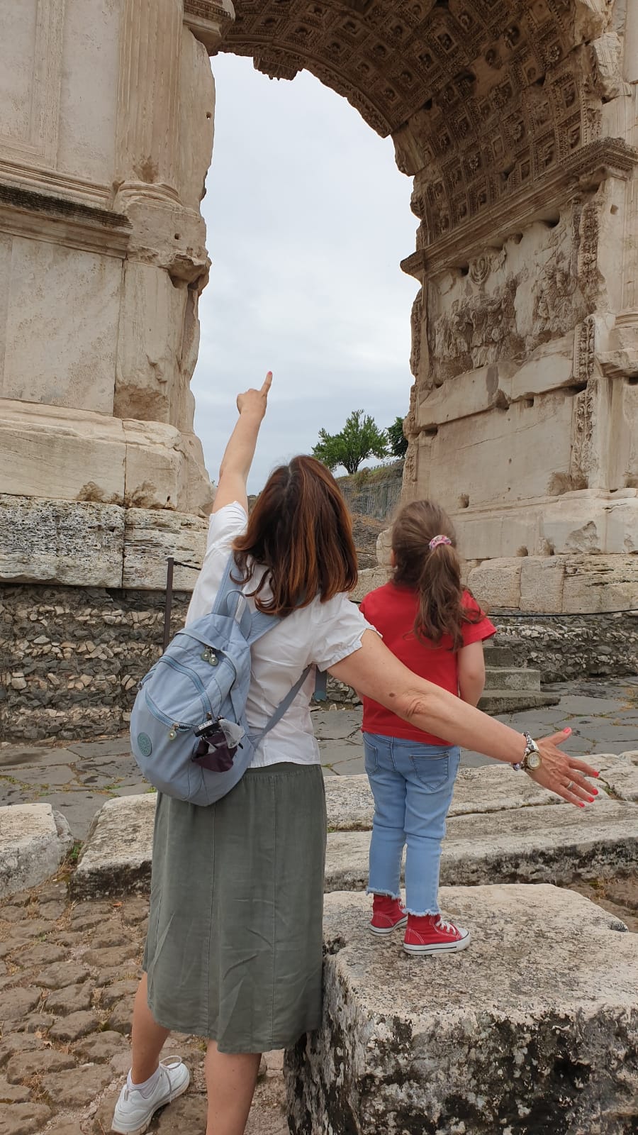 Naomi is looking the arch of Titus